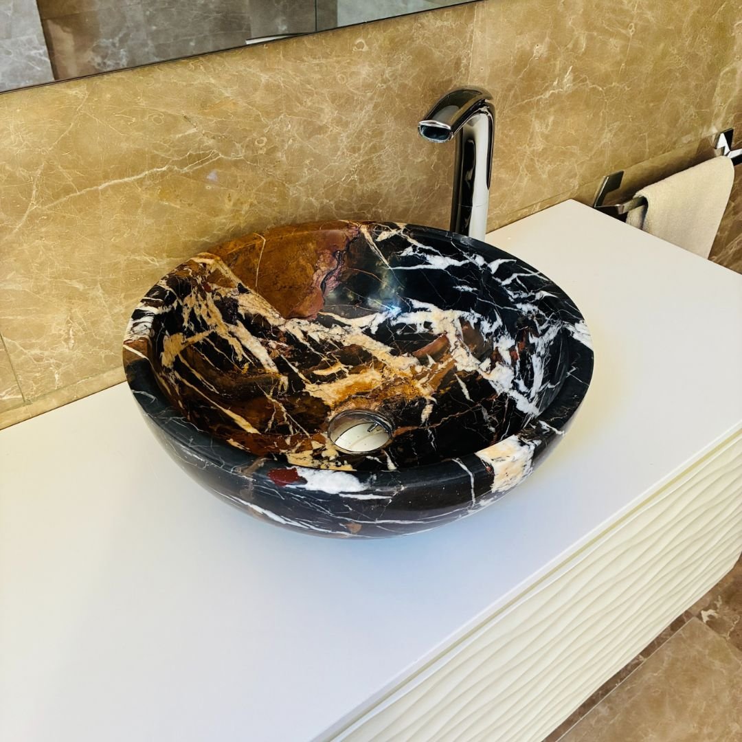 Lavabo de sobreponer en mármol negro con diseño exclusivo y acabado artesanal