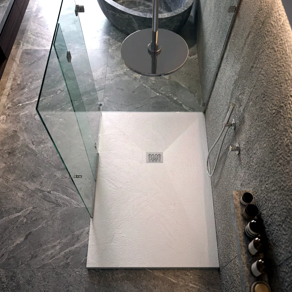 Plato de ducha pizarra instalado en un baño contemporáneo con líneas depuradas, acabado de carga mineral y perfil extraplano para una integración elegante en el espacio.